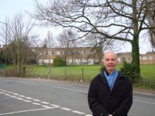 Cllr Roger Coales pictured in front of the old Courtney School