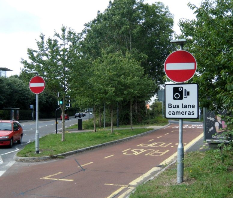 Bus lane enforcement camera signage at the junction of New Road and Brierly Furlong in Stoke Gifford, Bristol.