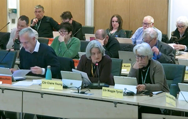Photo of councillors at a meeting.