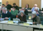 Photo of councillors at a meeting.